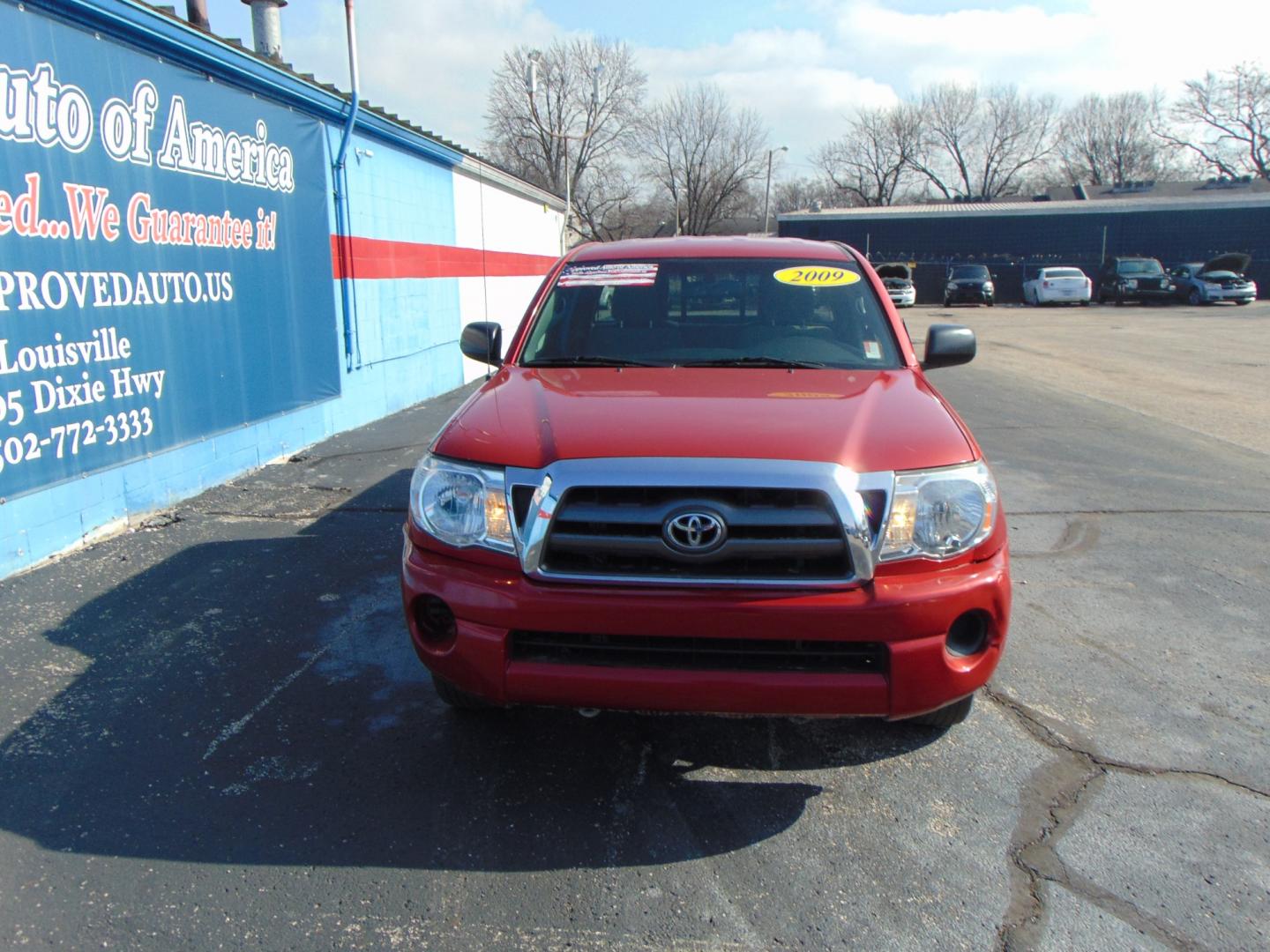 2009 Red Toyota Tacoma Access Cab (5TETX22N49Z) with an 4-Cyl 2.7 Liter engine, Manual, 5-Spd w/Overdrive transmission, located at 2105 Dixie Hwy, Louisville, KY, 40210, (502) 772-3333, 38.220932, -85.795441 - Photo#3